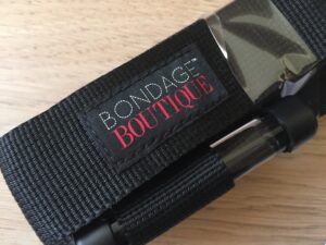 Bondage Boutique Door Swing Branding.